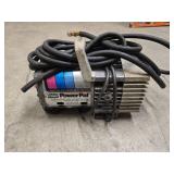 Portable PowerPal air compressor, jumper cables, 2 quarts of motor oil (Mag 1 is open and about 75% full) and one John Deer T19044 oil filter for tractors