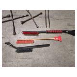 3 4-way lug wrenches (2 - 20" and 1 - 14" wrench), 2 lug nut wrenches (1 - 18" and 1 - 21") and 4 ice scrapers / snow brushes