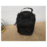 Vintage metal Kenworth sign, portable light, and mini tool case with a variety of tools