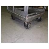 5 1/2 ft tall stainless steel rolling rack (several of the wheels are locked up so it doesn