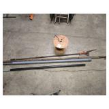partial spool of electrical wire, pole saw, 11