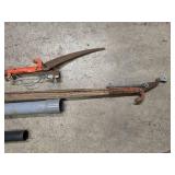 partial spool of electrical wire, pole saw, 11