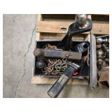 Several hitches, balls, tow chain and hitch ball wrench