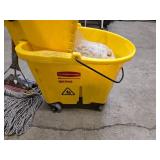 Rubbermaid Commercial mop bucket and wringer combo on wheels (missing 1 wheel), 1 mop and 1 replacement mop head