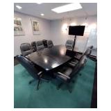 Conference Table with 8 adjustable executive arm chairs on wheels