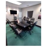 Conference Table with 8 adjustable executive arm chairs on wheels