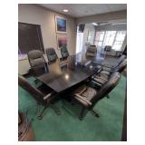 Conference Table with 8 adjustable executive arm chairs on wheels