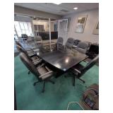 Conference Table with 8 adjustable executive arm chairs on wheels