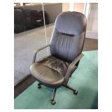 Conference Table with 8 adjustable executive arm chairs on wheels