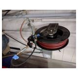 Self-retracting Storing Air Hose Reel with hose.