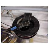Self-retracting Storing Air Hose Reel with hose.