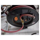 Self-retracting Storing Air Hose Reel with hose.