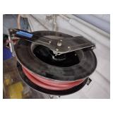 Self-retracting Storing Air Hose Reel with hose.