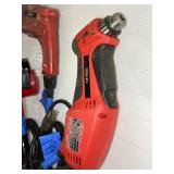 3 corded power tools: Milwaukee Magnum Hammer Drill, Milwaukee Reversing Drill, MHT 750 Heat Gun