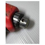 3 corded power tools: Milwaukee Magnum Hammer Drill, Milwaukee Reversing Drill, MHT 750 Heat Gun