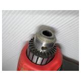 3 corded power tools: Milwaukee Magnum Hammer Drill, Milwaukee Reversing Drill, MHT 750 Heat Gun