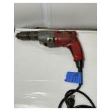3 corded power tools: Milwaukee Magnum Hammer Drill, Milwaukee Reversing Drill, MHT 750 Heat Gun