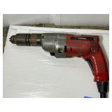 3 corded power tools: Milwaukee Magnum Hammer Drill, Milwaukee Reversing Drill, MHT 750 Heat Gun