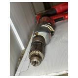3 corded power tools: Milwaukee Magnum Hammer Drill, Milwaukee Reversing Drill, MHT 750 Heat Gun