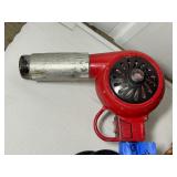 3 corded power tools: Milwaukee Magnum Hammer Drill, Milwaukee Reversing Drill, MHT 750 Heat Gun