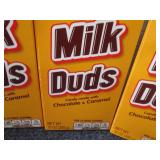 4- 10 oz Milk Duds...