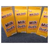 4- 10 oz Milk Duds...