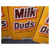 4- 10 oz Milk Duds...