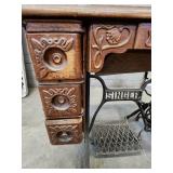 Antique Singer Sewing Machine Table with foot operated Crank and Detailed Carvings