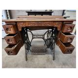 Antique Singer Sewing Machine Table with foot operated Crank and Detailed Carvings