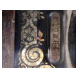 Antique Singer Sewing Machine Table with foot operated Crank and Detailed Carvings
