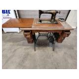 Antique Singer Sewing Machine Table with foot operated Crank and Detailed Carvings