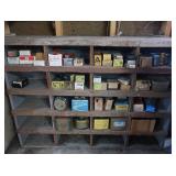 VINTAGE GARAGE SHELF FILLED WITH VINTAGE BOXES OF GOODIES