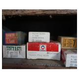 VINTAGE GARAGE SHELF FILLED WITH VINTAGE BOXES OF GOODIES