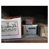 VINTAGE GARAGE SHELF FILLED WITH VINTAGE BOXES OF GOODIES