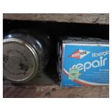 VINTAGE GARAGE SHELF FILLED WITH VINTAGE BOXES OF GOODIES