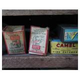 VINTAGE GARAGE SHELF FILLED WITH VINTAGE BOXES OF GOODIES