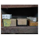 VINTAGE GARAGE SHELF FILLED WITH VINTAGE BOXES OF GOODIES