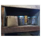 VINTAGE GARAGE SHELF FILLED WITH VINTAGE BOXES OF GOODIES