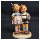 Collection of Hummel Figurines and Musical Wall Decor