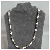 Elegant Black Beaded Necklace with Gold Accents