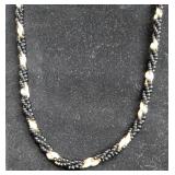 Elegant Black Beaded Necklace with Gold Accents