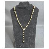 Elegant Gold Tone Beaded Necklace with Cross Pendant
