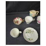 Collection of Vintage Bone China Tea Cups, Plates, and Creamers