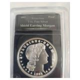 1882 "Shield Earring" Morgan