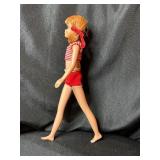 VINTAGE SKOOTER WEARING SWIMSUIT