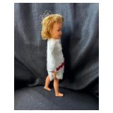 VINTAGE PEPPER DOLL WITH WHITE AND RED COAT
