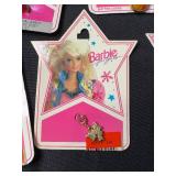 LOT OF BARBIE CHARMS AND RINGS ON ORIGINAL PACKAGE