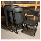 Four Black Metal Folding Chairs