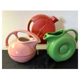 Art Deco Vintage Dusty Rose Glazed Overhead Ridged Handle Porcelain Pitcher and Two Vintage Art Deco Juice Pitchers