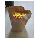 Paper Grocery Bag of Random Tile Leveling Clips
